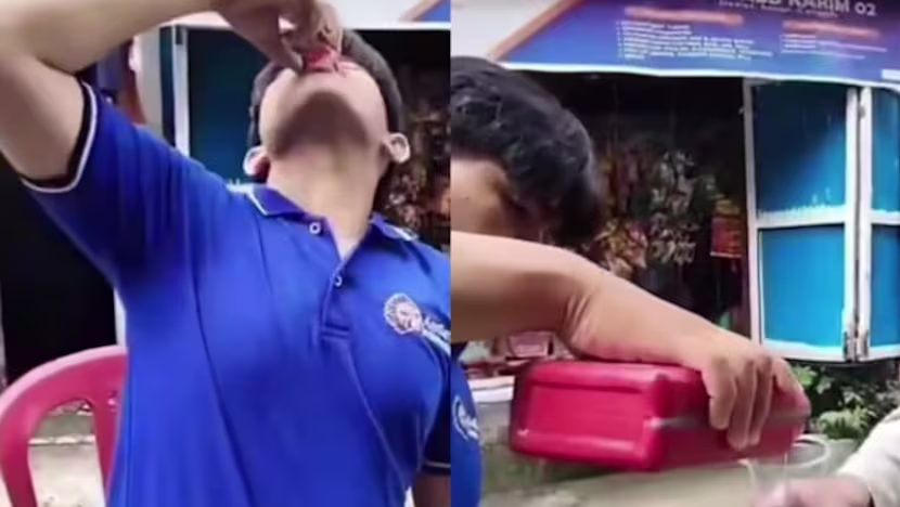 pemuda makasar minum oli [dok. web]